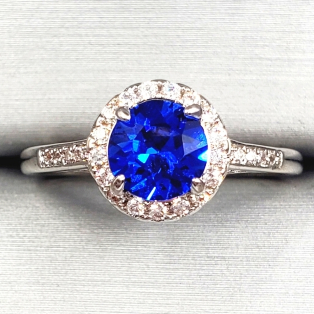 Blue Sapphire Simulant & Diamond Simulants Rhodium Plated Silver Tone Halo Ring